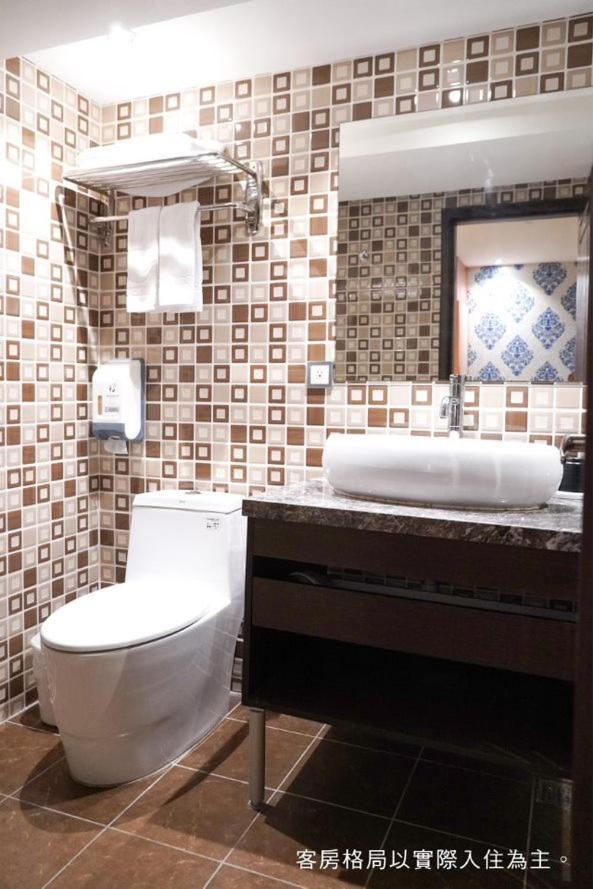 טאיצ'ונג Talmud Hotel Yizhong מראה חיצוני תמונה
